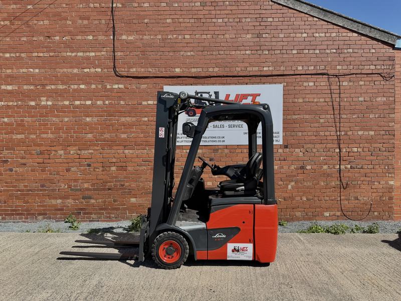 Electric counterbalance forklift with forks lowered, ready for hire