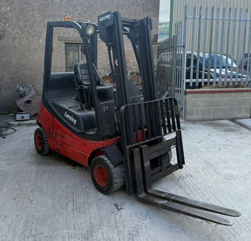 Forklift truck stripped for refurbishment in the Lift Tech workshop